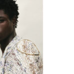 UKO PORTE CARDIGAN : SEWMOD.COLLIER CALLA EN OR ET DIAMANTS : VHERNIER. 1NSTANT JOAILLERIE.