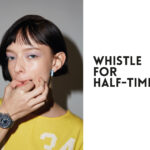 MONTRE LOUIS VUITTON TAMBOUR TAIKO SPIN TIME 39,5 MM. BOUCLE D’OREILLE AMBUSH WOMENSWEAR BLUE METAL EARRING.TEE-SHIRT AMBUSH YELLOW SHORT TSHIRT COTON.