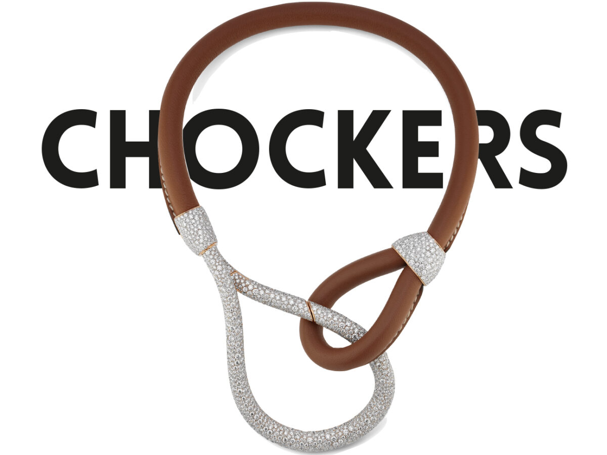 HAUTE JOAILLERIE. GUCCI & POMELATO. Collierle collier, un noeud en cuir souple marron s’entrelace avec un élément plus large en or rose pavé de diamants